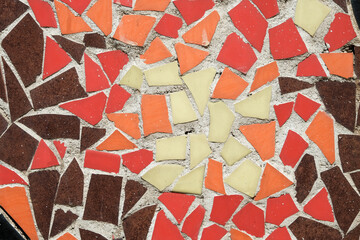 Colorful ceramic mosaic floor or wall. mosaic top view. Bathroom or kitchen floor wall design idea. Reused broken tile. Interior design. Colored eastern pottery