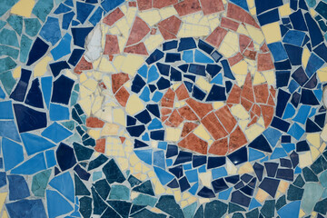 Colorful ceramic mosaic floor or wall. mosaic top view. Bathroom or kitchen floor wall design idea. Reused broken tile. Interior design. Colored eastern pottery