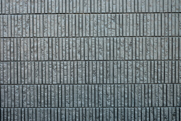Stone grey vertical regular texture pattern. Images print for background, material, backdrop, wall.