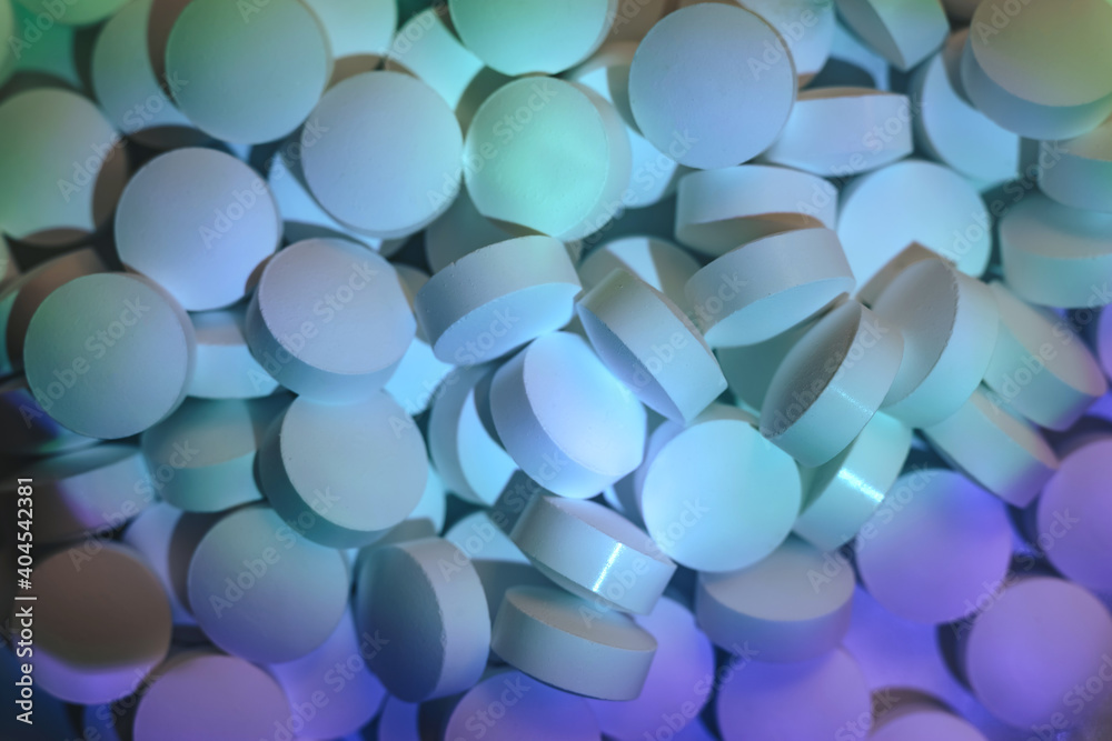 Poster pills or drugs in a package under neon light. beautiful background pattern for design.