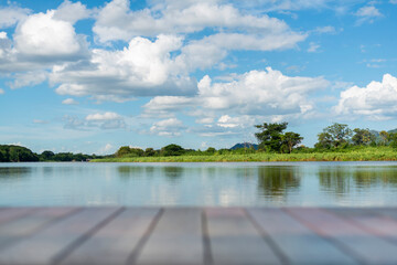 Forest river wild water view. Beautiful wooden jetty and Nice sky background with many shape...