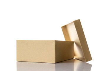 Carton box isolated. Brown cardboard package for shipping delivery on white background. Closed craft paper object mockup for design.