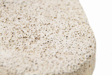 Bathroom spa foot scrubber for removing dead skin isolated on a white background closeup shot