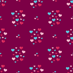 Colorful hearts pattern on deep pink background