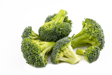 Green fresh broccoli on the white background