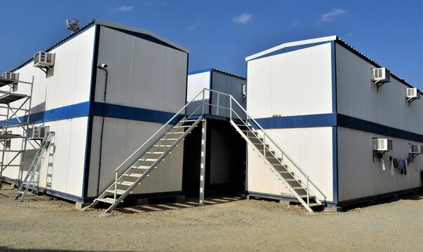 Portacabin, porta cabin, temporary labors camp , Mobile building in industrial site or office container Portable house and office cabins. Labor Camp. Porta cabin. small temporary houses