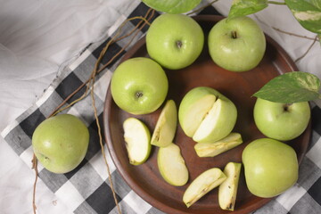 Fresh apples on a bowl, fruit food photo concept.