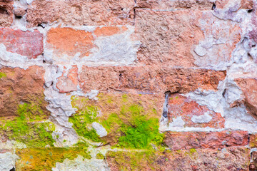Cracked concrete vintage brick wall background.