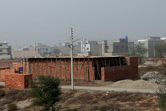 House under construction site view LDA avenue Lahore Pakistan