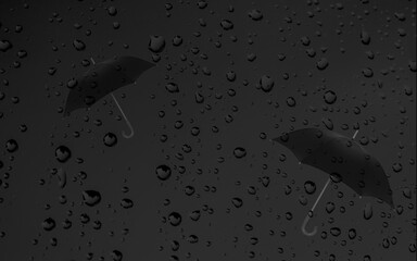 black umbrella on a dark background with raindrops