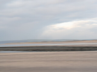 Fototapeta na wymiar Dreamy ICM ie Intentional camera movement blurry abstract landscape.