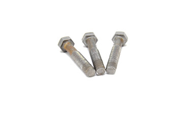 Rusty bolts on white background close-up. Engineering, industry, technology, fasteners