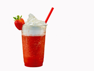Red blended strawberry fruit smoothie, cocktail or daiquiri in a clear cup with whipped cream and a straw on a white background.