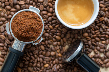 Freshly ground espresso in a portafilter, ready to be made into a hot shot of espresso