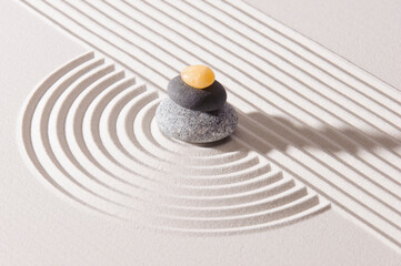Japanese zen garden with stone in textured sand - obrazy, fototapety, plakaty