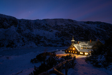 mountain shelter Samotnia in Karkonosze during  winter night in Poland