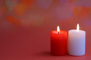 Valentines day banner. Two candel on the red background. Romantic background