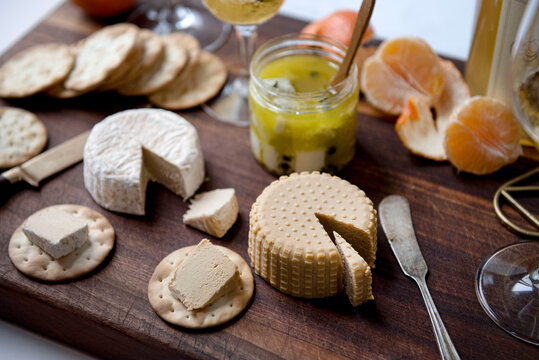Plant based, dairy free cheeses on wooden board