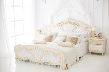 Elegant luxury bedroom. White interior
