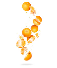 Whole and sliced fresh oranges in the air on a white background