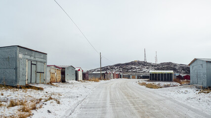 Fototapeta na wymiar Garages in the northern Arctic village of Lodeynoye, Kola Peninsula, Russia.