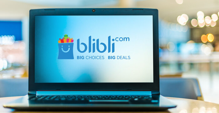 Laptop computer displaying logo of Blibli