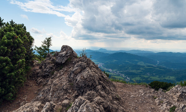 Maly Rozsutec hill summit in Mala Fatra mountains in Slovakia with Terchova village and hills on the background