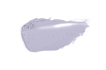 a smear of gray paint or cream is isolated on a white background