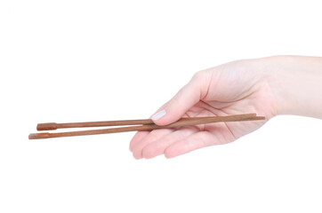 Sushi sticks in hand on white background isolation