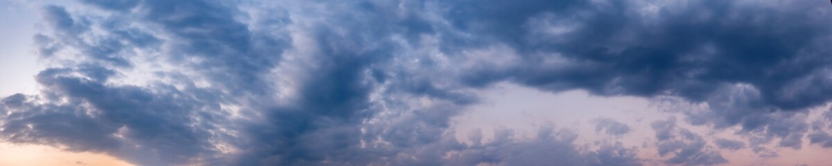 Dramatic panorama sky with storm cloud on a cloudy day. Panoramic image.