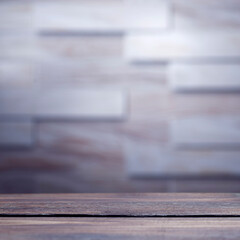 Wooden board empty table in front of blurred background. Perspective brown wood with brick background - can be used to display or assemble your products. Mock up