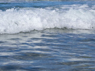 Fototapeta premium Waves, sea and sand on the beach of Famara in Lanzarote, Spain