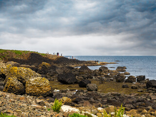 Northern Ireland, UK.  Atlantic coast with Giant’s Causeway, unique natural geological formations...