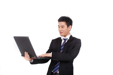 Asian yopung Business man Holding Laptop Computer 