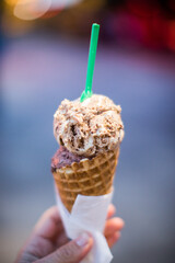 holding an ice cream cone