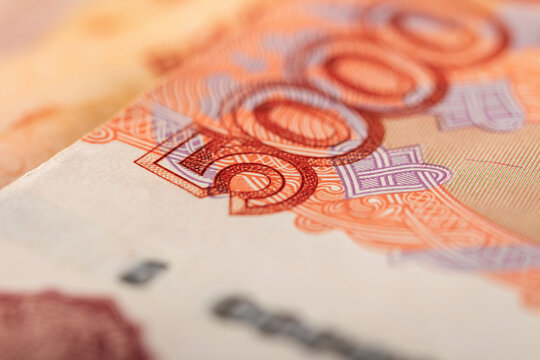 Banknote of the Russian Federation, with a face value of 5000 rubles, close-up. Macrophotography. Blurred background.