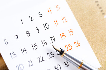 white calendar page for 2021 month schedule to make an appointment or manage the schedule every day with ballpoint pen for marks