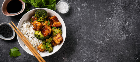 Fried tofu bowl with broccoli and rice. Vegan food