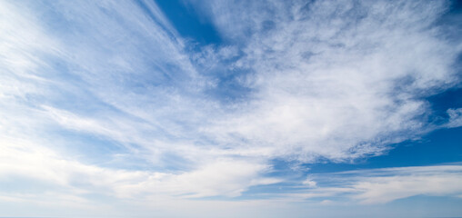Blue sky with beautiful natural white cirrus clouds