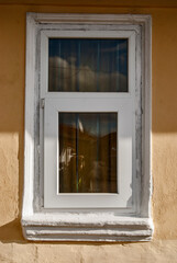 Old rural country house wooden window closeup