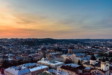 Fototapeta na wymiar View on historic center of the Lviv at sunset. View on Lvov cityscape from the town hall