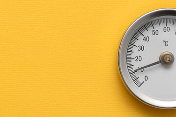 Water temperature meter on the yellow abstract background. - obrazy, fototapety, plakaty
