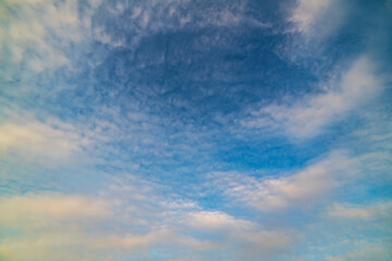 Beautiful colorful bright sunset sky with orange clouds. Nature sky background.