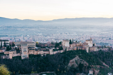 Fototapeta na wymiar Alhambra palace in Granada at sunset from San Miguel lookout
