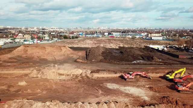 aerial view of excavators work on a construction site, Aerial view of  excavator working