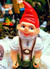 Garden gnome. Figurines to decorate your garden. Garden dwarf. A hero from fairy tales. Fantasy.