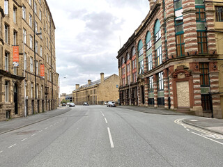 Looking down, Sunbridge Road, lined with Victorian buildings in, Bradford, Yorkshire, UK