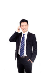 Portrait of a businessman standing with cellular phono