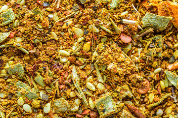 A mixture of different spices close up. Textures of colorful spices and condiments.Colorful Herbal and Spices Oriental.Cafe concept.Various Indian spices