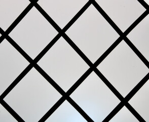 Black and white background of leaded light window with copy space